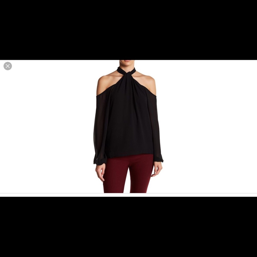 Women’s naked zebra twist mock neck blouse